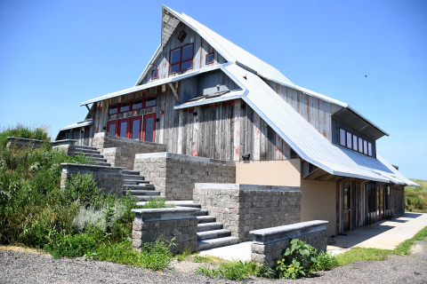 A former Sands family barn moved to the site in 2007 has been built into the edge of the Gjerloff Prairie and converted into the Charles L. Whitney Education Center.