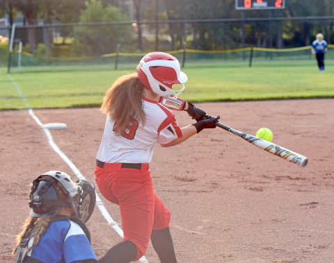 Kaelin Sparr sends a liner to left during Aurora's 6-1 win over Centennial. 