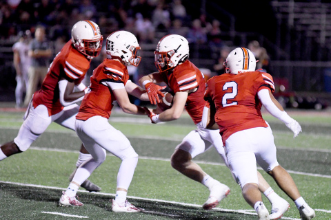 The Aurora backfield was a well-oiled machine Friday. Pictured here as a play starts to unfold against Hastings are, from left: Mack Owens, Drew Knust, Britton Kemling and Carlos Collazo.