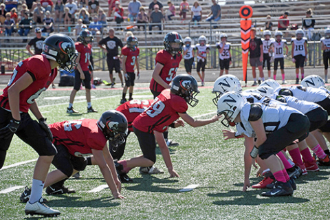Stone Ott times the snap to get off the line quickly alongside his defensive teammates from left, Davis Nachtigal, Matthew Proctor, Cash Garrett and Kyler Eberly. 
