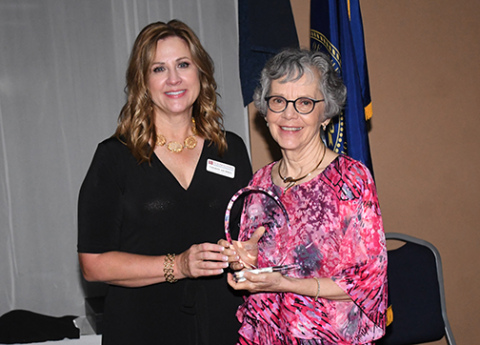 Accepting the Hamilton Community Foundation’s Unsung Hero Award on behalf of the late Tim Otto was his sister, Sue Washburn. Presenting the award is Tammy Morris.