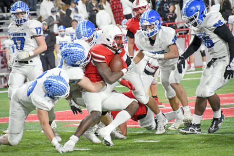 Mack Owens won’t go down easy as five Bennington Badgers hunt down the Aurora senior. Owens is part of the 2022 senior class which played in 14 of a possible 16 playoff games over their high school careers, posting an 11-3 mark in the postseason. 