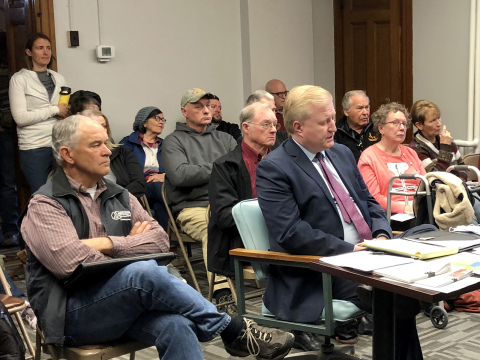 Deputy Secretary of State (elections division) Wayne Bena listened in, then spoke during Monday’s public hearing.