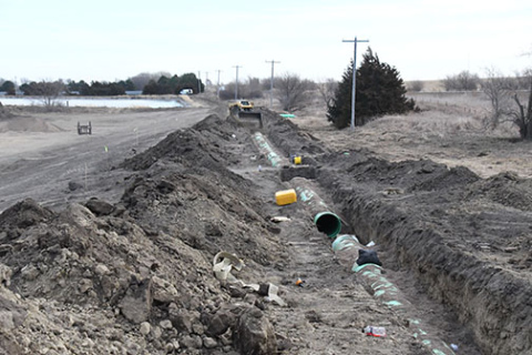 News-Register/Kurt Johnson Crews were busy last week just off the No. 4 green at Poco Creek Golf Course digging trenches and burying 24-inch pipes as part of the south interceptor sewer line expansion project.
