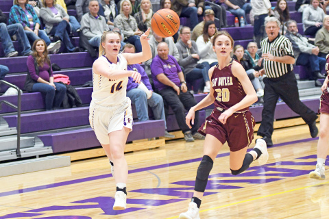 Kylie Mersch sends a pass up the floor past the East Butler press during Hampton’s 58-57 win Friday, its second of the week. 