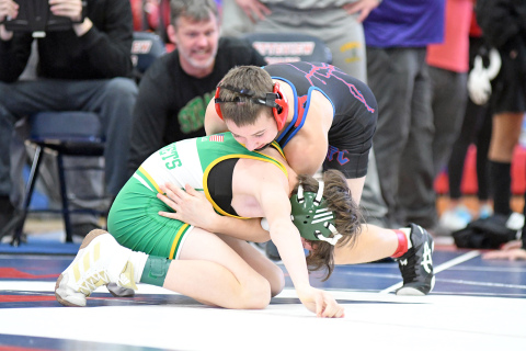 Javier Marino earns a pinfall victory over Lincoln North Star’s Toby Lammers in his first round matchup at Platteview Friday. Marino ended the day with a second place finish. 