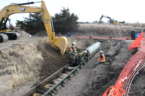 Work crews monitor massive, high-tech boring equipment used to bore holes under the roadroad tracks just off No. 4 green at Poco Creek Golf Course. The hole will now be filled with pipe as part of the city’s South Interceptor Sewer expansion project.