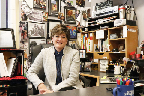 Aurora elementary special education teacher Luey Shultz is officially retiring after 33 years of teaching -- 32 spent here in Aurora. She is pictured here in front of her “wall of heartstrings.”
