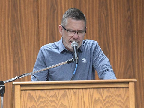 Former Aurora football coach Randy Huebert, who now works as an area representative for the Fellowship of Christian Athletes, was the keynote speaker at a National Day of Prayer breakfast in Aurora.