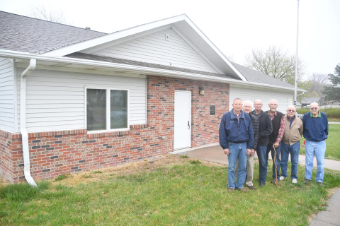 Freemason members from left to right: Master Wayne Brehm, Ken Schultz, Ron Perry, James Wahl, Oscar Lundquist and J.C. Cranfill stand in front of the No. 68 Lodge on L Street which was sold on May 5.