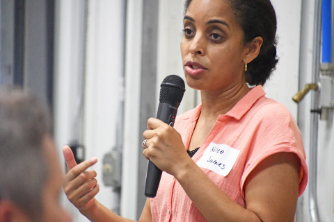 Mercaris C.E.O. Kellee James takes up the microphone, during Grain Place Food’s annual field day event, for a speech on the commodity market and its affects on the organic farm industry.  