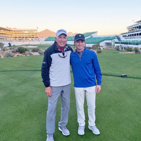 Levi SaBell, 2017 Aurora graduate, stands on the iconic No. 16 stadium hole at TPC Scottsdale in Arizona alongside Bob Vokey, one of the biggest names in golf. 