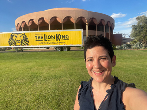 Top: Tereasa Payne takes a selfie in front of a Lion King theater production. Payne has done work fork for bands, orchestras and television but stated that theater offered her the most variety. Below: Payne plays on the pan flute at one of her performances. 