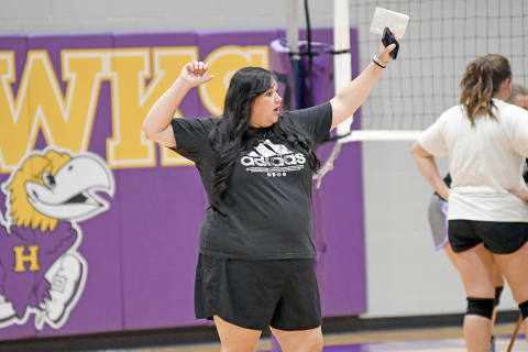 Former Hampton standout Kayla Gaughen takes over the Hawk volleyball program from her former coach, Diane Torson, who retired after 36 seasons. 
