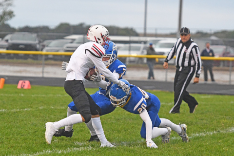 Aurora receiver Carsen Staehr is brought down after a 34-yard completion on Aurora’s first drive against St. Paul. The senior had his best night statistically of the 2022 season, catching seven passes for 117 yards and a touchdown. 