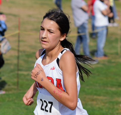 Alexis Ericksen was the freshman of the meet with a third place effort at Aurora's home race Friday. 