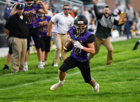 Jack Bullis carries the ball for Hampton in a 32-12 loss at home to Sterling Friday. 