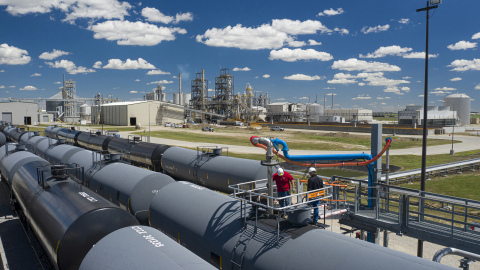 Crews work to fill rail cars with ethanol at the Aurora West facility on the edge of town. A new partnership was announced this week with a goal of increasing productivity and efficiency.