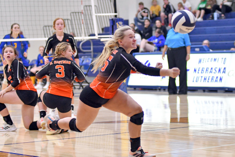 Kinley Kaczor reaches out to save a loose ball towards the back line in Giltner’s five-set loss to Nebraska Lutheran Friday. 