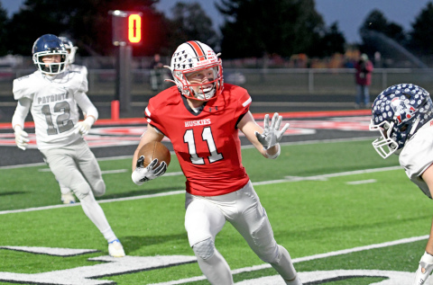 Aurora's Drew Knust had three total touchdowns in Aurora's 41-7 win against Adams Central. 
