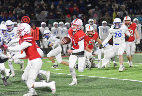 Drew Knust rushed for five touchdowns in Aurora's 48-28 win over Lincoln Christian. 