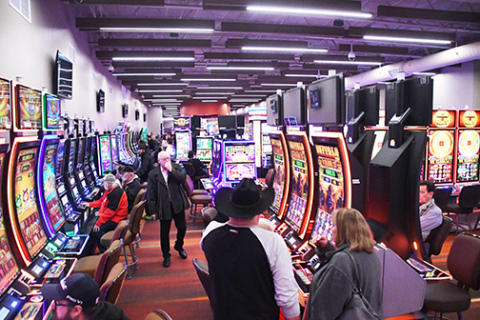 The Grand Island Casino opened Tuesday with 300 slot machines available. Plans have been announced for a large casino and hotel to open on the same site, with construction set to begin this fall.