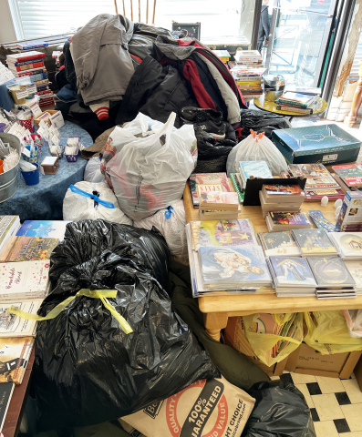 Coats and other winter clothing donated for the Pine Ridge Reservation at Susan’s Books and Gifts. Coat drive organizer and president of the nonprofit Whiteclay Makerspace stated hundreds, estimating 700-800, of coats were donated.