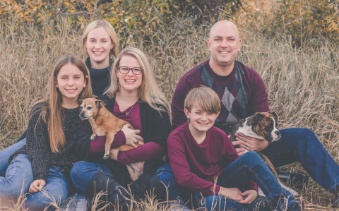 The Janousek family with, from left, Emma, Mady, Dizzy, Chelsea, Kevin, Ryan and Roxy at the Chalco Recreation Area in Omaha. Chelsea and Kevin married in 2017.