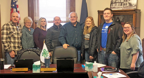 Hamilton County commissioners passed a resolution Monday declaring February as National 4-H Month. Pictured from left after the brief ceremony are commissioners Francis McDonald, Nancy Salmon, Nicole SaBell, John Thomas, Rich Nelson, along with 4-Hers Sarah Mead and Logan McKay, and newly-hired 4-H coordinator Emily Soll.