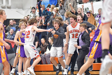 The Giltner bench celebrates after defeating Hampton 47-45 Friday night. 