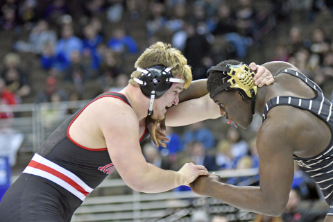 Aurora's Jack Allen and GINW's Victor Isele battle in the Class B heavyweight final. 