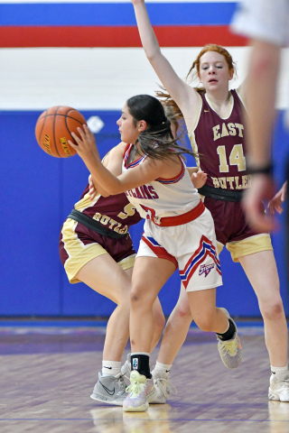 Gahvi Lesiak looks for an open teammate out of an East Butler halfcourt trap during HPC’s dominant 54-17 win Friday night. 