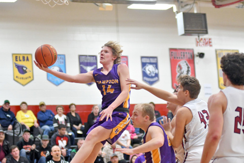 Hampton’s Wyatt Dose soars through the lane for a layup duing a 56-39 loss to Fullerton in the D2-6 subdistrict tournament last week. 