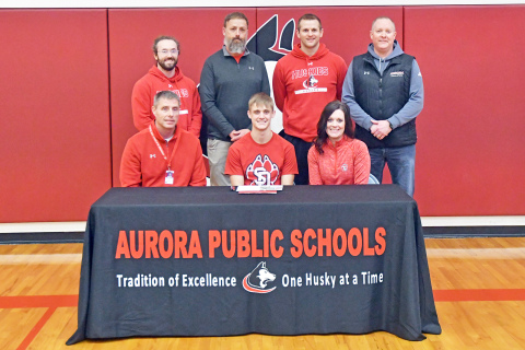 Carsen Staehr signed with the University of South Dakota’s track team alongside his parents, Jay and Kim, as well as Aurora track coaches AJ Farrand, KC Lathrop, Cole Carraher and Gordon Wilson. 