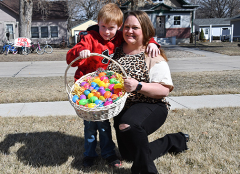 Eli and Amy Lewis show off their basket full of eggs ready for laying this upcoming Easter season. Eli is raising money for Aurora Adopt-A-Pet animal shelter to buy items on their Amazon wish list.
