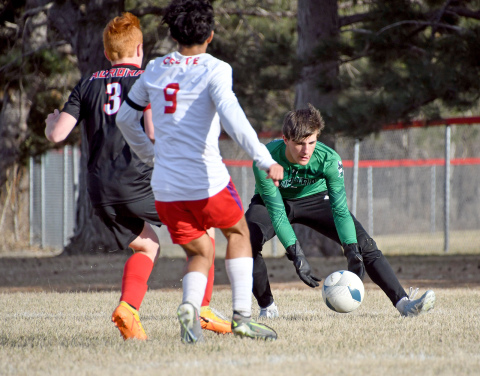 Devin Otto defends in goal for the Huskies in last week's win over Crete.