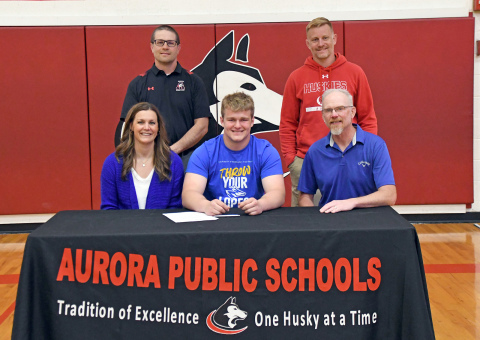 Aurora’s Jack Allen will continue his academic and wrestling careers at the University of Nebraska-Kearney, officially signed April 17 alongside his parents, John and Suzanne, as well as Aurora coaches Derek Keasling and Jeremy Dubas. 