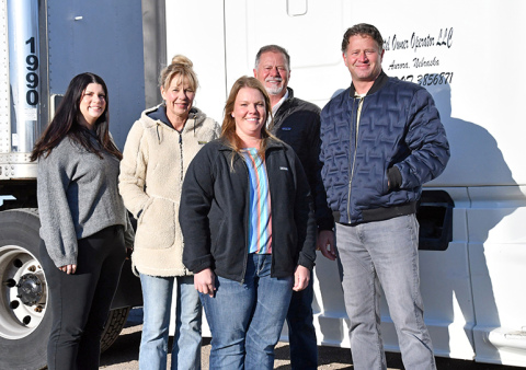 Amanda Senkbile, pictured front and center, became the first female to earn her Commercial Driver’s License through International Workforce Services. Pictured back from left are: Celie Holliday, Crystal, David and Todd Vettel. 