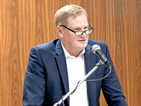 Aurora business owner and state Board of Education member Kirk Penner addresses those gathered for the annual National Day of Prayer Breakfast at the Leadership Center on Thursday morning.