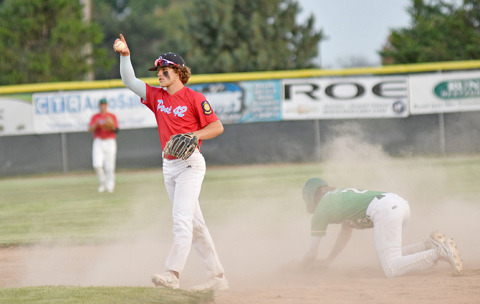 Aurora’s Chase Phillips points toward catcher Dylan Dubas after throwing out a baserunner at second base during an 8-7 win over Central City in the Pinnacle Bank Seniors’ home opener last week. 