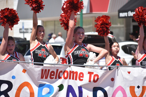 Aurora cheerleaders were among the many smiling and waving during Saturday's A'ROR'N Days parade.