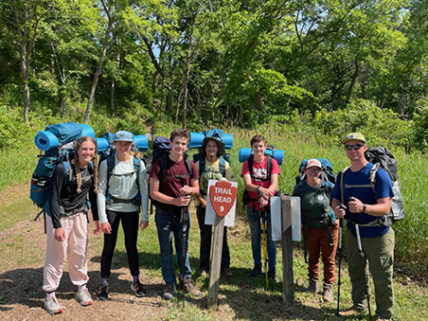 Students enjoyed a backpacking trip, learning new outdoor recreation skills, during time at Indian Cave State Park. From left: Lanee Connell, Carly Connell, Atticus Miller, Zildjian Sandberg, Calvin Miller (YNE students) and Josie Ivy (Prairie Plains Intern), Alex Briner (backpacking instructor).