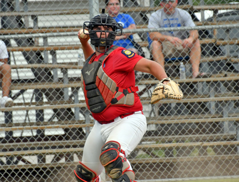 Dylan Dubas, shown here catching a game earlier this season, notched six RBIs, including a grand slam, in Aurora’s 12-3 win at Wood River Thursday. 