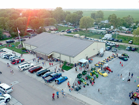 Phillips Memorial Hall, seen here at the community celebration on July 3, is being sold to the Phillips Community Foundation. The decision to sell the property and a nearby village storage building to the foundation was made at the July 11 meeting of the village board. 
