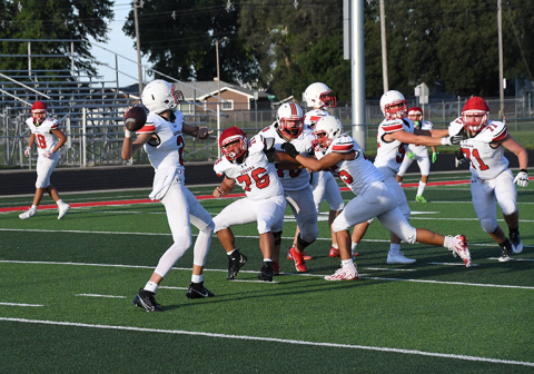 Booker Scheierman prepares to throw a pass during Saturday's scrimmage.