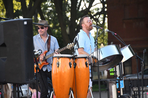 From left, Soca Jukebox band members Jason Riley and Clay Johnston perform classic hits that connected with an audience of all ages.
