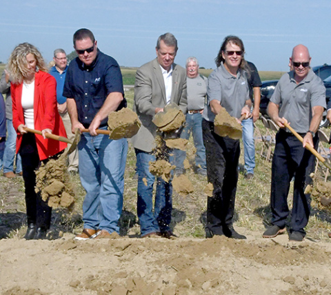 Gov. Jim Pillen, center, participated in the ground breaking at the Mission Critical site on Aug. 11