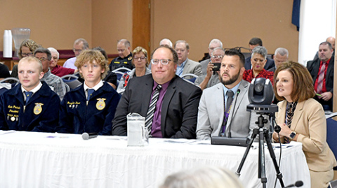 Hampton Public Schools made a presentation on the Hawk Herd program Friday to the Nebraska Department of Education Board during its meeting, a day after the board visited the school. Pictured from left are Evan Pankoke, Brayden Dose, ag teacher Joel Miller, Principal Carson Klute and Supt. Holly Herzberg.