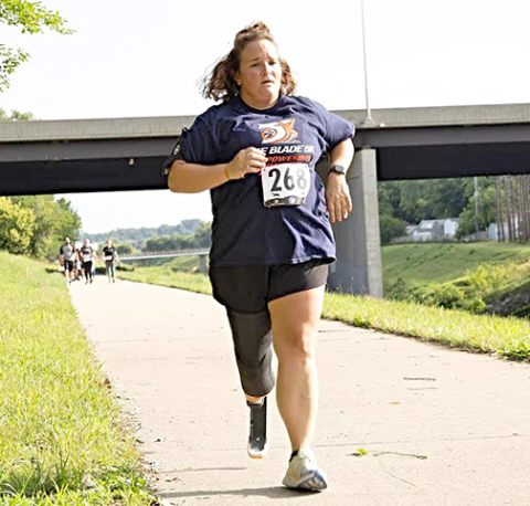 Sara Brown runs in The Blade 5K using her state-of-the-art running blade. 