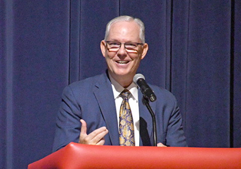 NDE Commissioner Brian Maher addresses the Aurora teaching staff last week during a three-day visit here, which included a Friday board meeting at The Leadership Center.